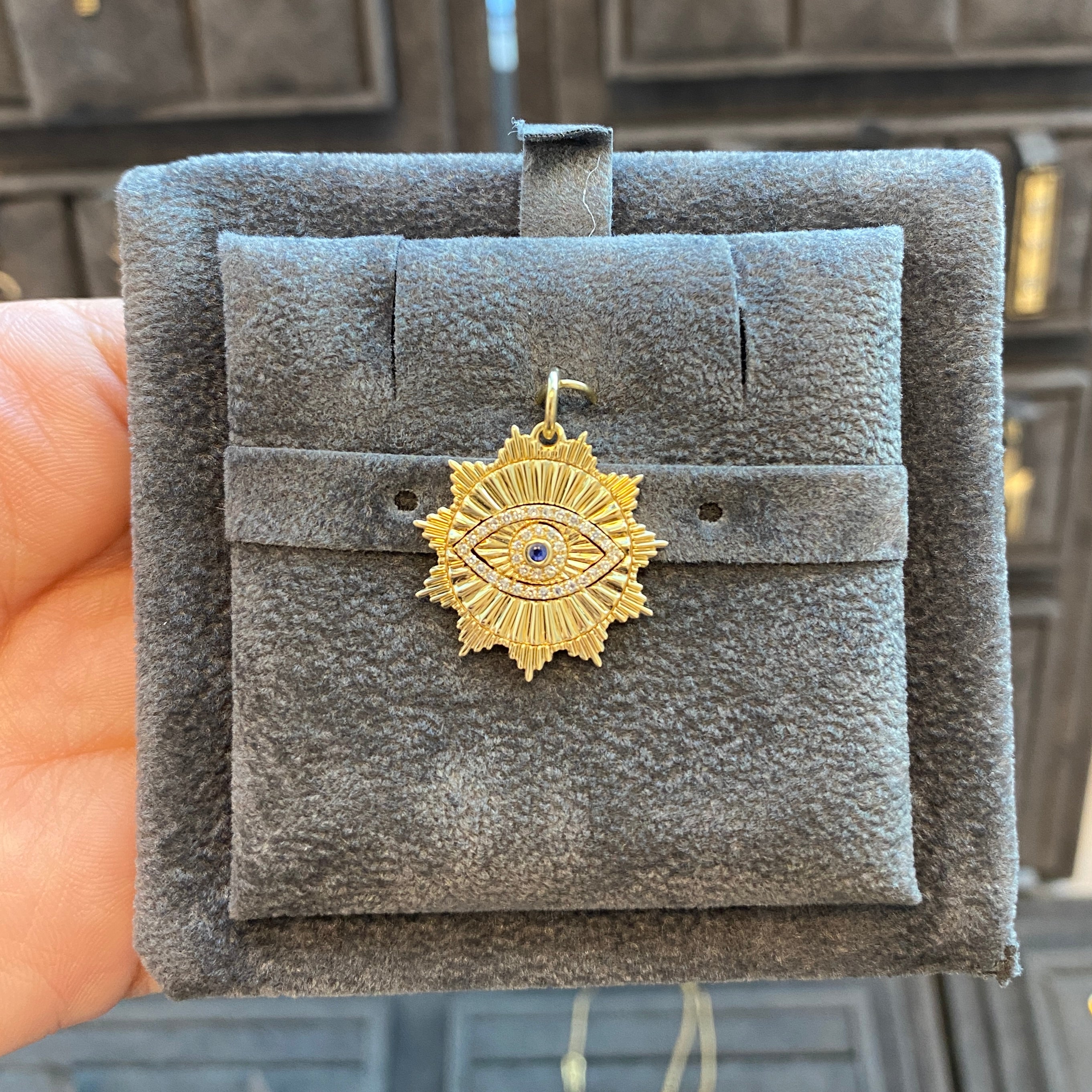 - Fluted Evil Eye Charm -